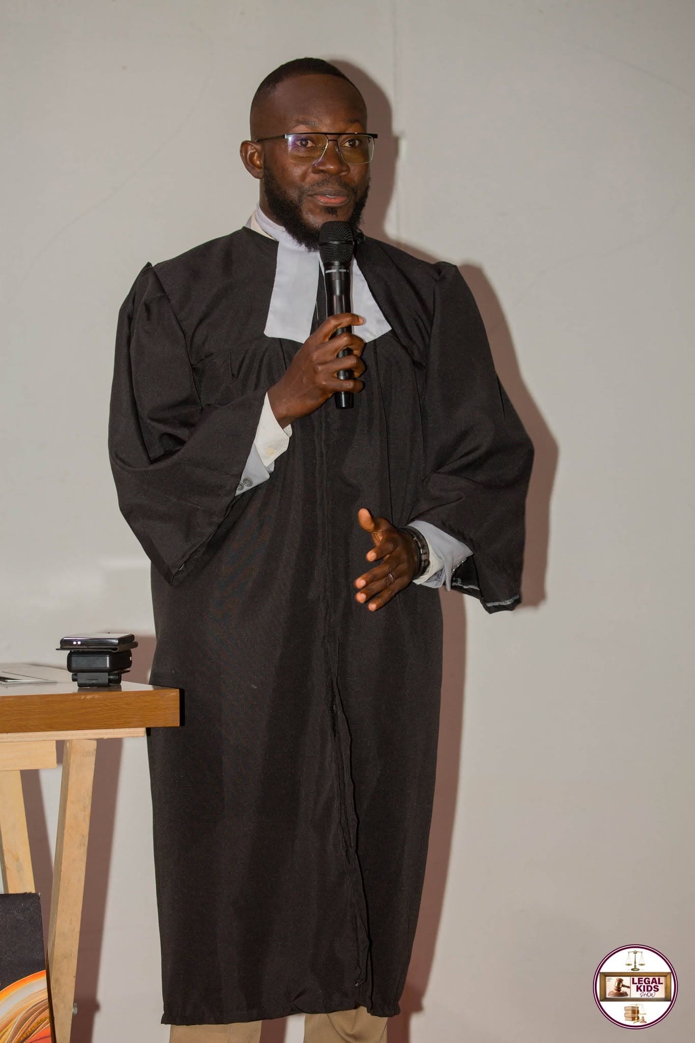 Legal Kids co-host presenting in legal attire